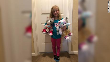 Daphne used the $100 to buy two plush cats from Build-a-Bear.