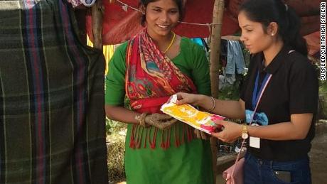 Nisha with a My Padbank team member, Delapeer Slum, Bareilly, India on December 3, 2019. 