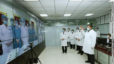 Chinese President Xi Jinping talks to medical staff on duty via a video link at Beijing Ditan Hospital in Beijing on Febuary 10.