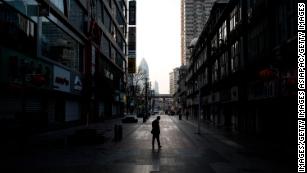 A man walks on an empty street in Wuhan, China, on February 13, 2020.