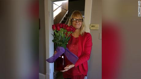 Tracey with Rich&#39;s flower arrangement from 2016.