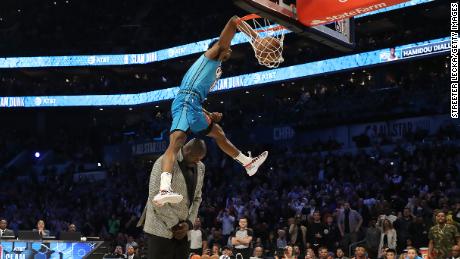 Hamidou Diallo #6 of the Oklahoma City Thunder dunks over Shaquille O&#39;Neal during the AT&amp;T Slam Dunk as part of the 2019 NBA All-Star Weekend at Spectrum Center on February 16, 2019 in Charlotte, North Carolina. 