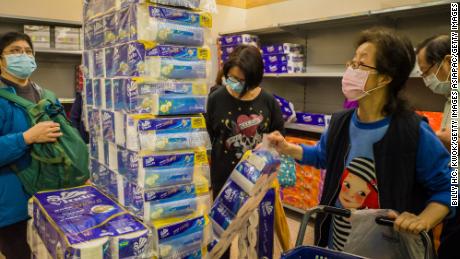 Hong Kong residents buying toilet rolls amid fears of shortages on February 11, 2020.