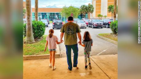 Ryan Newman, with his daughters, leaving the hosptial after the crash.