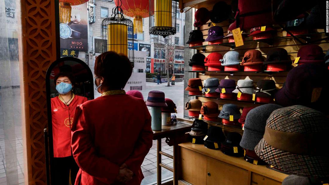 A sales clerk wears a mask as she waits for customers at a hat shop in Beijing on February 18.&lt;a href=&quot;http://www.cnn.com/2020/02/14/economy/coronavirus-china-economy-small-businesses/index.html&quot; target=&quot;_blank&quot;&gt; &lt;/a&gt;Small companies that help drive China&#39;s economy &lt;a href=&quot;http://www.cnn.com/2020/02/14/economy/coronavirus-china-economy-small-businesses/index.html&quot; target=&quot;_blank&quot;&gt;are worried about how much damage&lt;/a&gt; the coronavirus outbreak will cause to business.