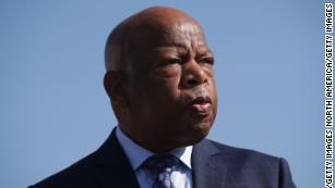 John Lewis marches across Edmund Pettus Bridge to commemorate 55th anniversary of 'Bloody Sunday' 