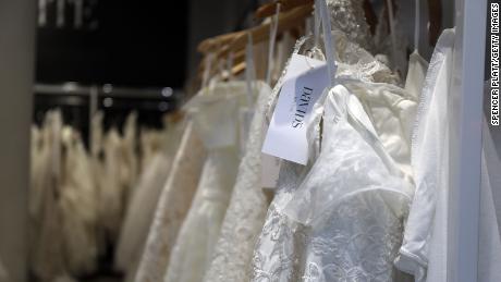 NEW YORK, NY - NOVEMBER 19:  Wedding dresses are displayed in a window at a David&#39;s Bridal store in Manhattan on November 19, 2018 in New York City. The wedding dress retailer has filed for Chapter 11 bankruptcy protection on Monday. The company, which will continue to operate throughout bankruptcy, is coming to terms with changing consumer tastes in the wedding industry and a heavy debt load.  (Photo by Spencer Platt/Getty Images)