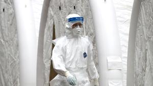 SEOUL, SOUTH KOREA - FEBRUARY 21: A medical professional is seen at a preliminary testing facility at the National Medical Center where patients suspected of contracting coronavirus (COVID-19) are assessed on February 21, 2020 in Seoul, South Korea. South Korea reported 52 new cases of the coronavirus (COVID-19) bringing the total number of infections in the nation to 156, with the potentially fatal illness spreading fast across the country. (Photo by Chung Sung-Jun/Getty Images)