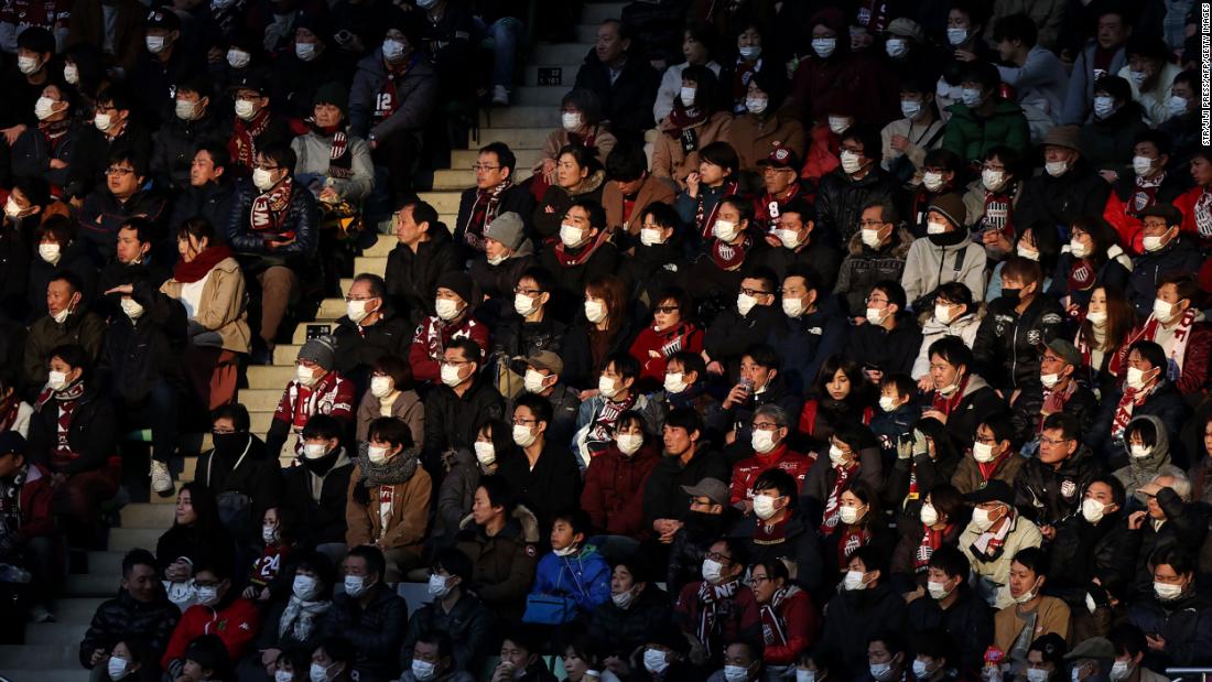 People attend a professional soccer match in Kobe, Japan, on February 23, 2020. To help stop the spread of the novel coronavirus, the soccer club Vissel Kobe &lt;a href=&quot;https://www.espn.com/soccer/vissel-kobe/story/4057914/iniestas-vissel-kobe-ban-singing-chanting-due-to-coronavirus-threat&quot; target=&quot;_blank&quot;&gt;told fans not to sing, chant or wave flags&lt;/a&gt; in the season opener against Yokohama FC.