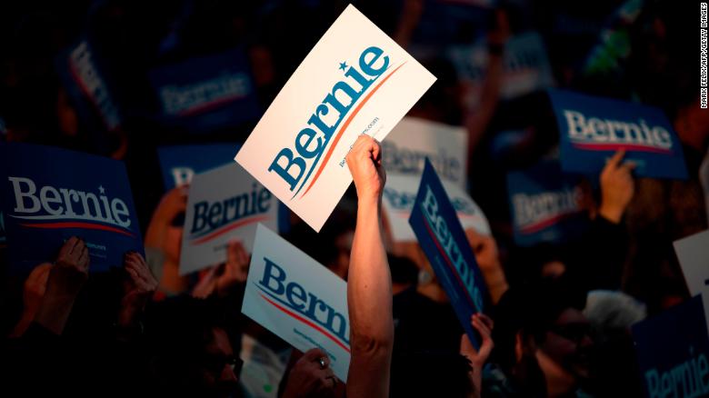 Supporters of Democratic presidential hopeful Vermont Senator Bernie Sanders cheer during a rally at Houston University in Houston, Texas on February 23, 2020. 