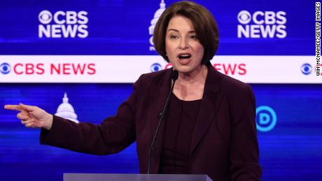 Democratic presidential candidate Sen. Amy Klobuchar (D-MN) speaks as former Vice President Joe Biden (L) and Tom Steyer (R) look on during the Democratic presidential primary debate at the Charleston Gaillard Center on February 25, 2020 in Charleston, South Carolina. 