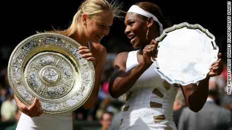 Sharapova poses with Serena Williams after the 2004 Wimbledon final. 