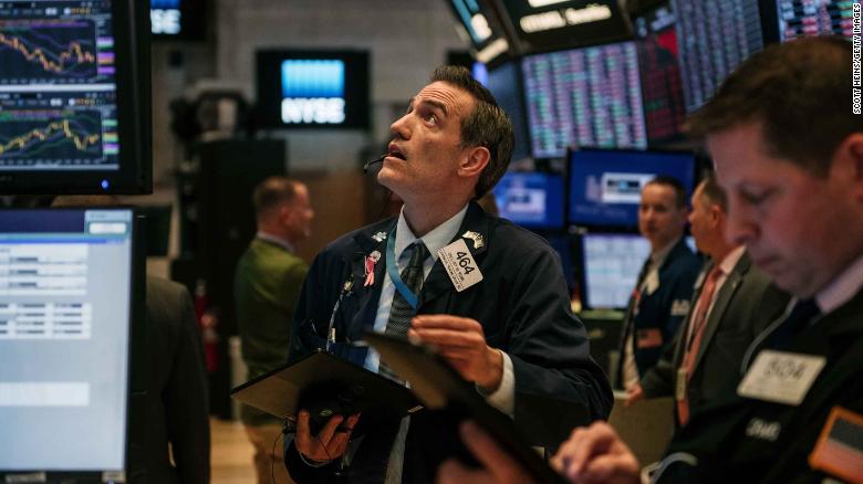 Stocks fall into correction