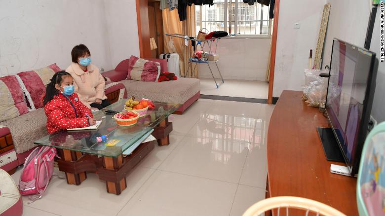 A student attends an online class at home in Nanchang City, in east China&#39;s Jiangxi Province, February 10, 2020. 