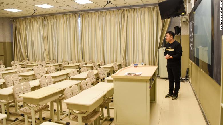 Teacher Zhang Weibao shoots a video course at a middle school in Urumqi, northwest China&#39;s Xinjiang Uygur Autonomous Region, on February 3, 2020. 