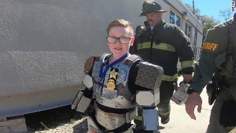 Make-A-Wish helped a 10-year-old superhero stop a bank robbery and rescue someone from a burning building