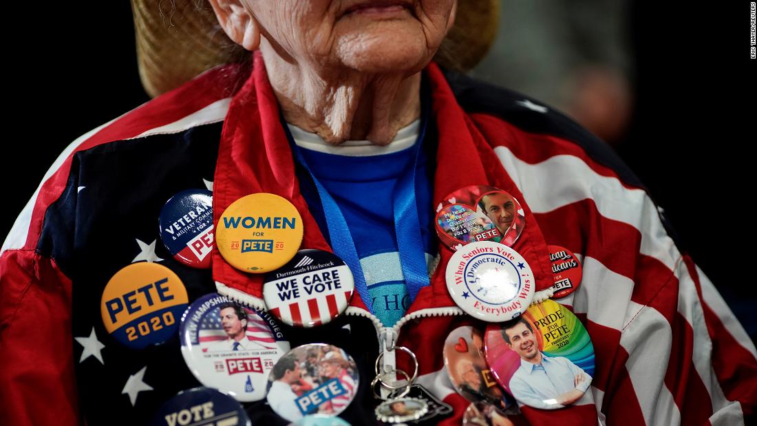 A Buttigieg supporter flaunts buttons during a campaign event in Columbia.