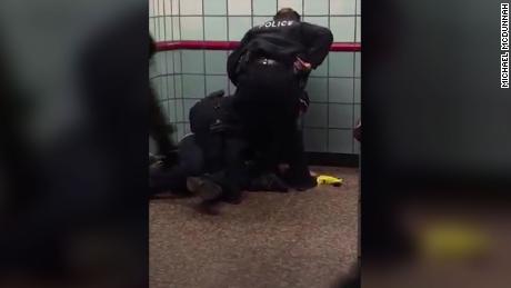 Chicago officers are under investigation after video shows police shooting a man at a train station