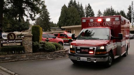 An ambulance transports a patient from the Life Care Center of Kirkland, the long-term care facility linked to the two of three confirmed coronavirus cases in the state, in Kirkland, Washington, U.S. March 1, 2020. REUTERS/David Ryder