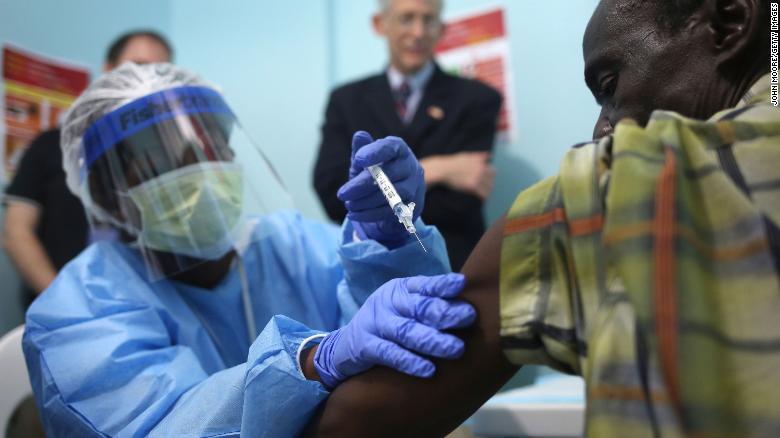 A nurse administers an injection during an Ebola vaccine study at Redemption Hospital, formerly an Ebola holding center, in February, 2015, in Monrovia, Liberia.