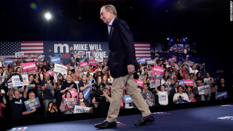 Bloomberg walks off stage after speaking during a rally, Tuesday, March 3, 2020, in West Palm Beach, Fla.