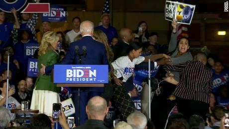 Biden and family startled as protesters rush the stage as he speaks