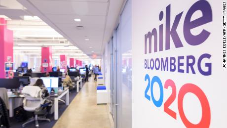 Office workers are seen in the Bloomberg campaign headquarters near Times Square on January 30, 2020