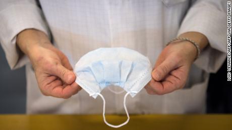 As coronavirus spreads, suppliers are rationing face masks