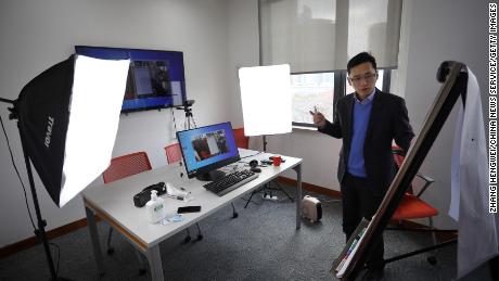 Li Xiaorong, an associate professor at Shanghai Jiao Tong University, conducts an online course via a live streaming platform amid the coronavirus outbreak.