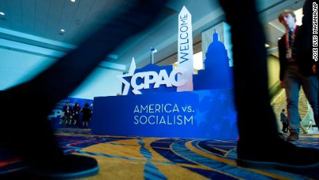 This year, the signs at CPAC declared &#39;America vs. Socialism&#39; as the theme.