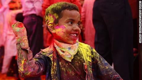 A child suffering from cerebral palsy celebrates Holi, the spring festival of colours, during an event origanized by Trishla Foundation, a non-profit organisation for cerebral palsy treatment, in Allahabad on March 6, 2020. (Photo by SANJAY KANOJIA / AFP) (Photo by SANJAY KANOJIA/AFP via Getty Images)