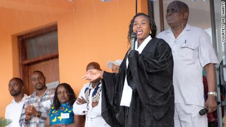 As class leader and valedictorian, Faith Cherop delivers a speech at her college graduation.