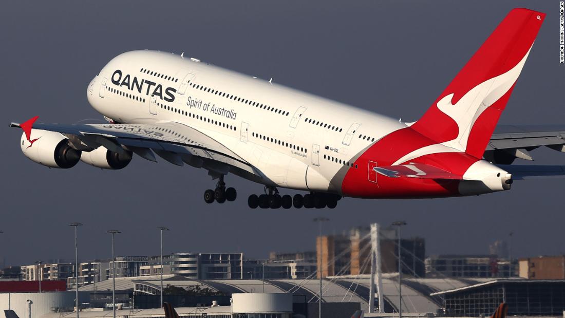 Qantas cuts almost a quarter of its flights over coronavirus fears - CNN