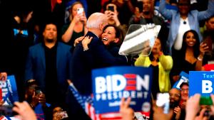 California Senator Kamala Harris (C) hugs Democratic presidential candidate former Vice President Joe Biden after she endorsed him at a campaign rally at Renaissance High School in Detroit, Michigan on March 9, 2020. (Photo by JEFF KOWALSKY / AFP) (Photo by JEFF KOWALSKY/AFP via Getty Images)