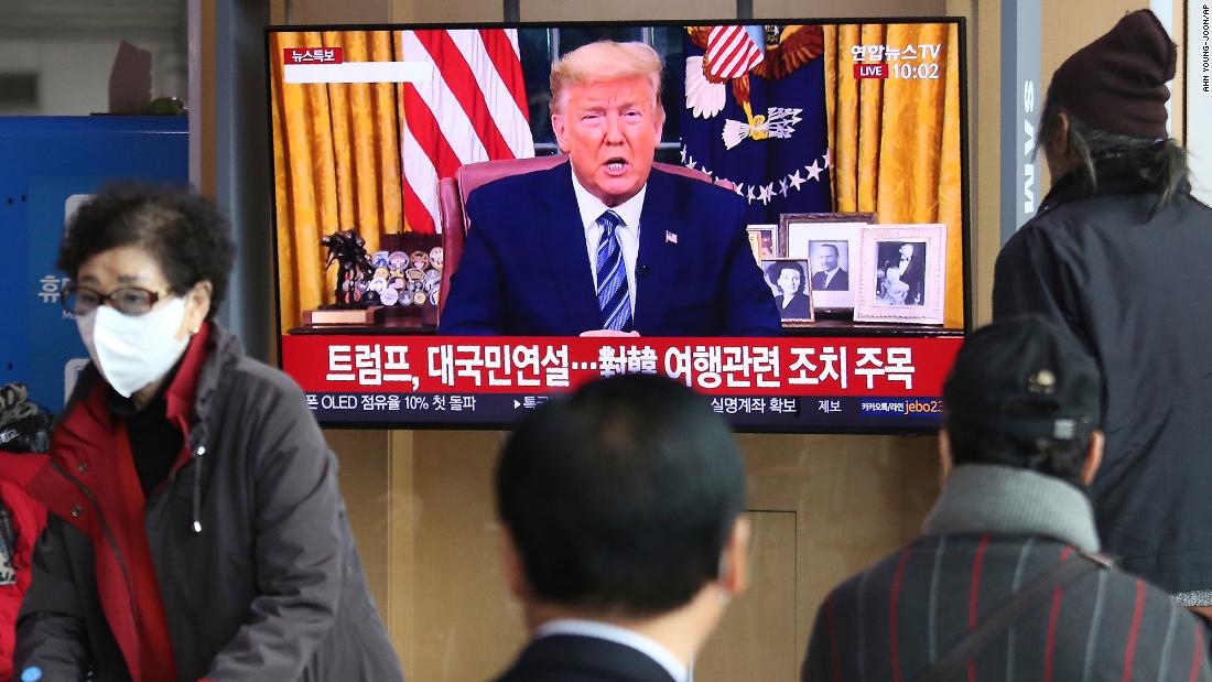 People at a railway station in Seoul, South Korea, watch a live broadcast of US President Donald Trump on March 12, 2020. Trump announced that, in an effort to slow the spread of the coronavirus, he would &lt;a href=&quot;https://www.cnn.com/2020/03/11/politics/donald-trump-coronavirus-statement/index.html&quot; target=&quot;_blank&quot;&gt;sharply restrict travel&lt;/a&gt; from more than two dozen European countries.