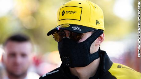 Renault F1 Team driver Esteban Ocon wearing a mask for protection against Coronavirus disease.
