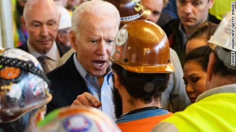 TOPSHOT - Democratic presidential candidate Joe Biden has  heated exchange meets workers and discusses gun rights as he tours the Fiat Chrysler plant in Detroit, Michigan on March 10, 2020. - Biden opened primary day meeting workers at an under-construction automobile plant in Detroit, where he received cheers but also was confronted by one worker. In an exchange avidly shared online by Trump supporters, the worker, wearing a construction helmet and reflective vest, accused Biden of seeking to weaken the constitutional right to own firearms. &quot;You&#39;re full of shit,&quot; Biden shot back. &quot;I support the Second Amendment.&quot;
When the worker pressed the issue, Biden, visibly agitated and with a raised voice, said &quot;I&#39;m not taking your gun away,&quot; adding, &quot;Gimme a break, man.&quot; (Photo by MANDEL NGAN / AFP) (Photo by MANDEL NGAN/AFP via Getty Images)