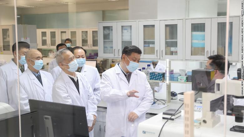 Chinese President Xi Jinping inspects scientific research on the coronavirus during his visit to the Academy of Military Medical Sciences in Beijing on March 2.