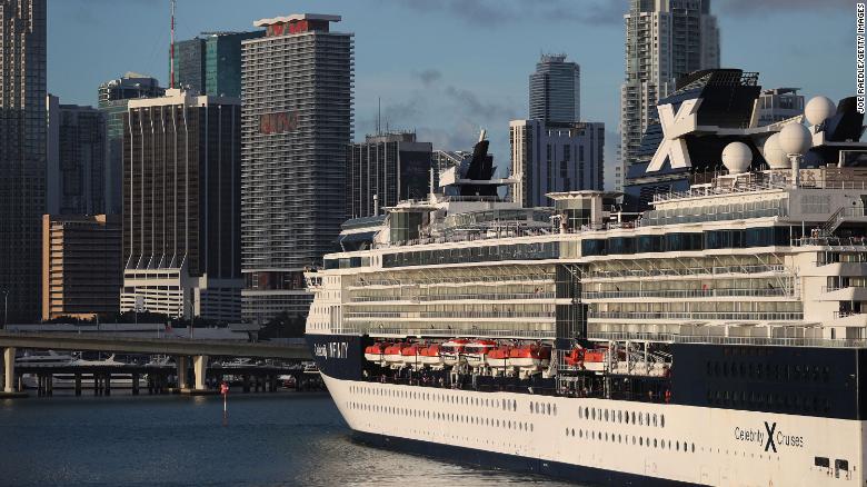 The Celebrity Infinity cruise ship returns to port in Miami from the Caribbean as cruise lines suspend operations on March 14, 2020.