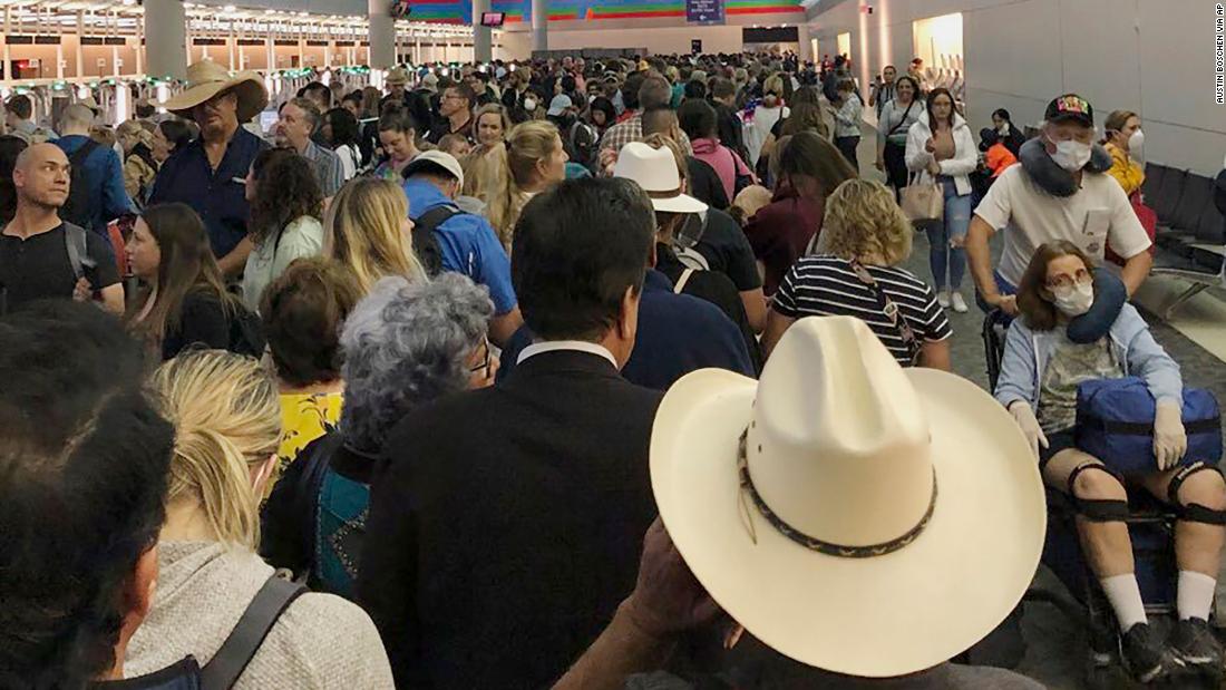 People wait in line to go through customs at Dallas/Fort Worth International Airport on March 14. Travelers returning from Europe say they were &lt;a href=&quot;http://www.cnn.com/travel/article/coronavirus-airport-screening-sunday/index.html&quot; target=&quot;_blank&quot;&gt;being made to wait for hours &lt;/a&gt;at US airports, often in close quarters, as personnel screened them for the coronavirus.