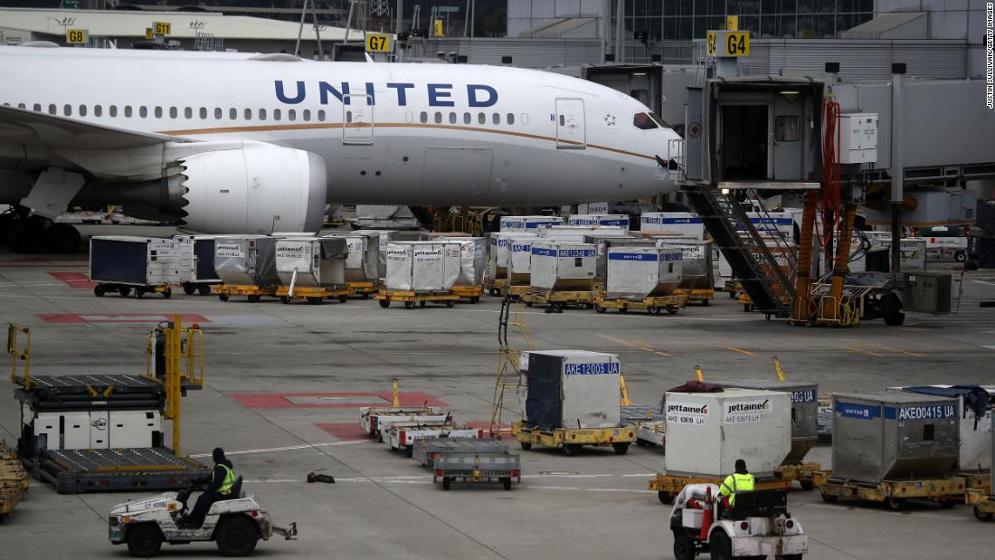 United slashes its schedule 50%; seeks cost savings from unions