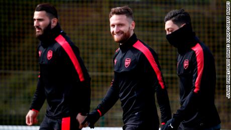Arsenal&#39;s Shkodran Mustafi (center) and Mesut Ozil (right) have been gaming while football has been postponed.