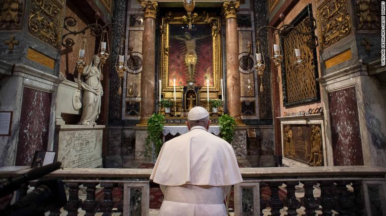 Pope Francis prays ast San Marcello al Corso church in Rome, home to a crucifix which believers say helped to end an outbreak of the plague in 1522.