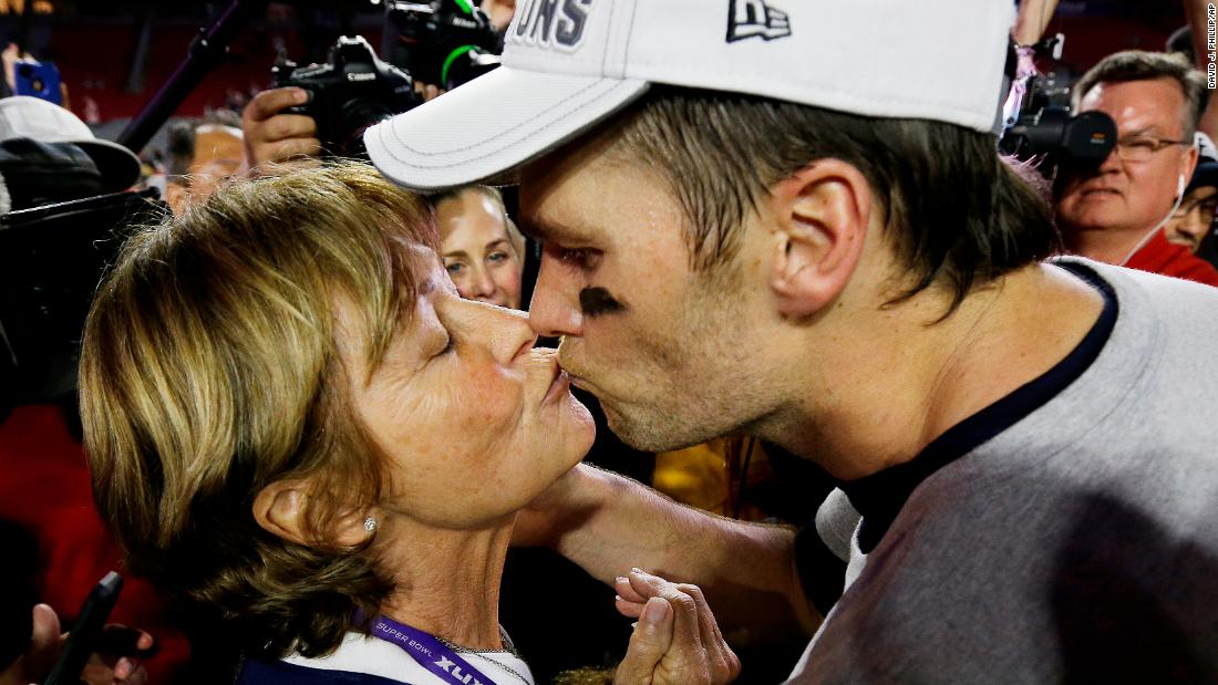 Brady kisses his mother, Galynn, after the Patriots defeated Seattle for their fourth Super Bowl title in February 2015.