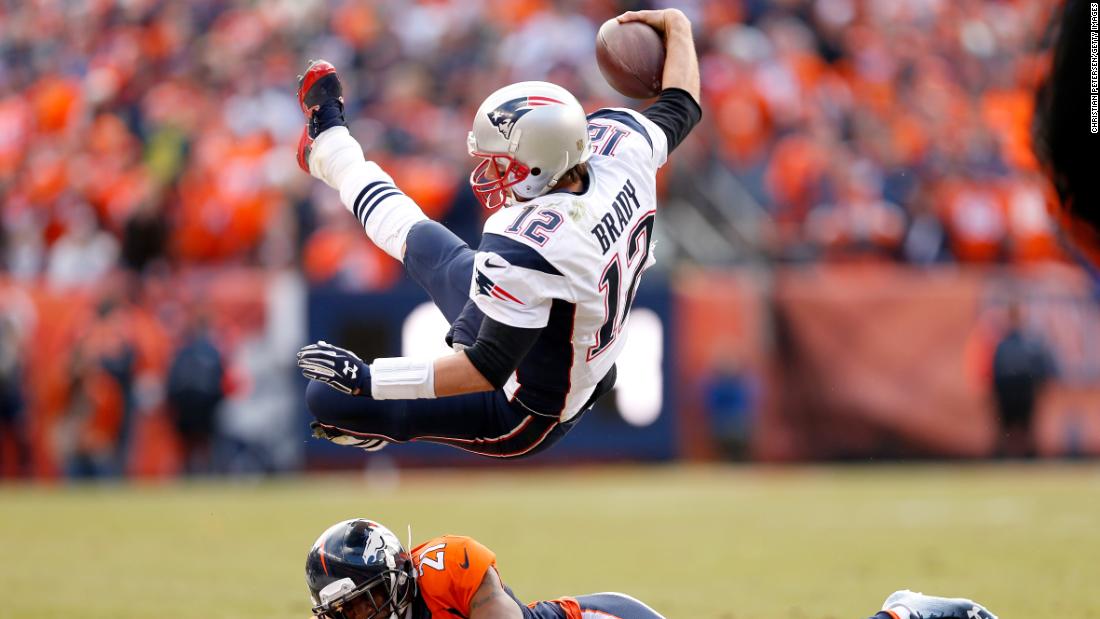 Brady is tackled by Denver&#39;s Aqib Talib in the AFC Championship game in January 2016.