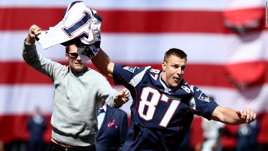 Teammate Rob Gronkowski playfully steals Brady&#39;s jersey before a Boston Red Sox baseball game in April 2017. Brady had just had his Super Bowl jersey returned by authorities after it had been stolen from the locker room.