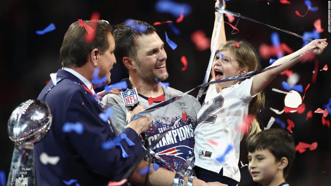 Brady celebrates with his daughter, Vivian, after winning his sixth Super Bowl in 2019.