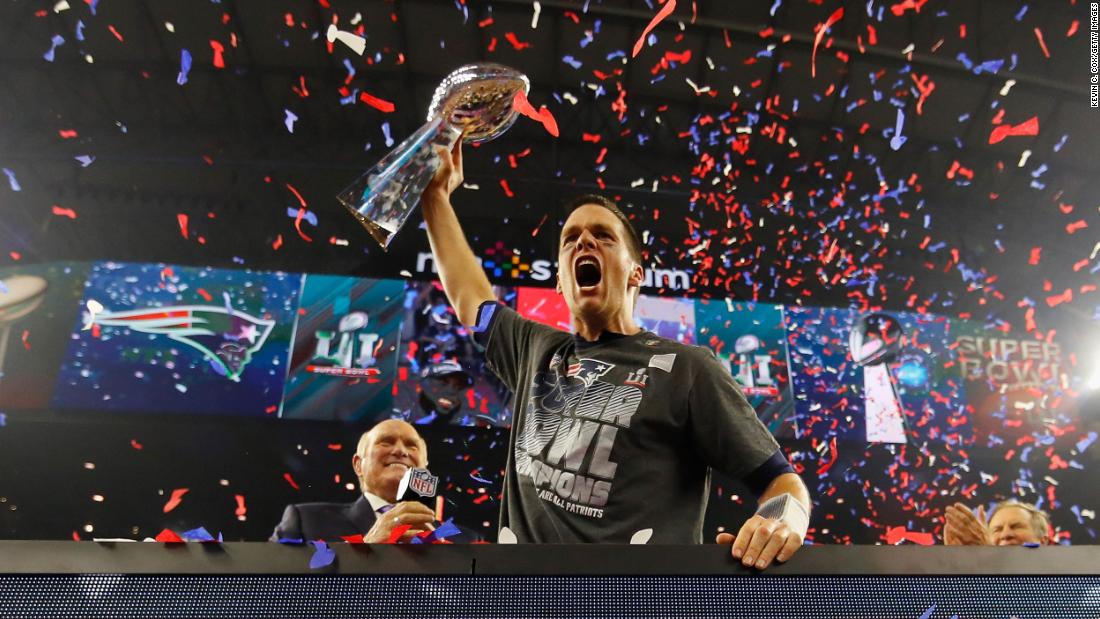 Brady raises the Vince Lombardi Trophy after leading the Patriots to their fifth Super Bowl victory in 2017. The Patriots were trailing 28-3 before pulling off the biggest Super Bowl comeback ever and winning in overtime.