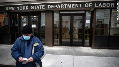 Visitors to the Department of Labor are turned away at the door by personnel due to closures over coronavirus concerns.