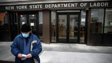 Visitors to the Department of Labor are turned away at the door by personnel due to closures over coronavirus concerns.